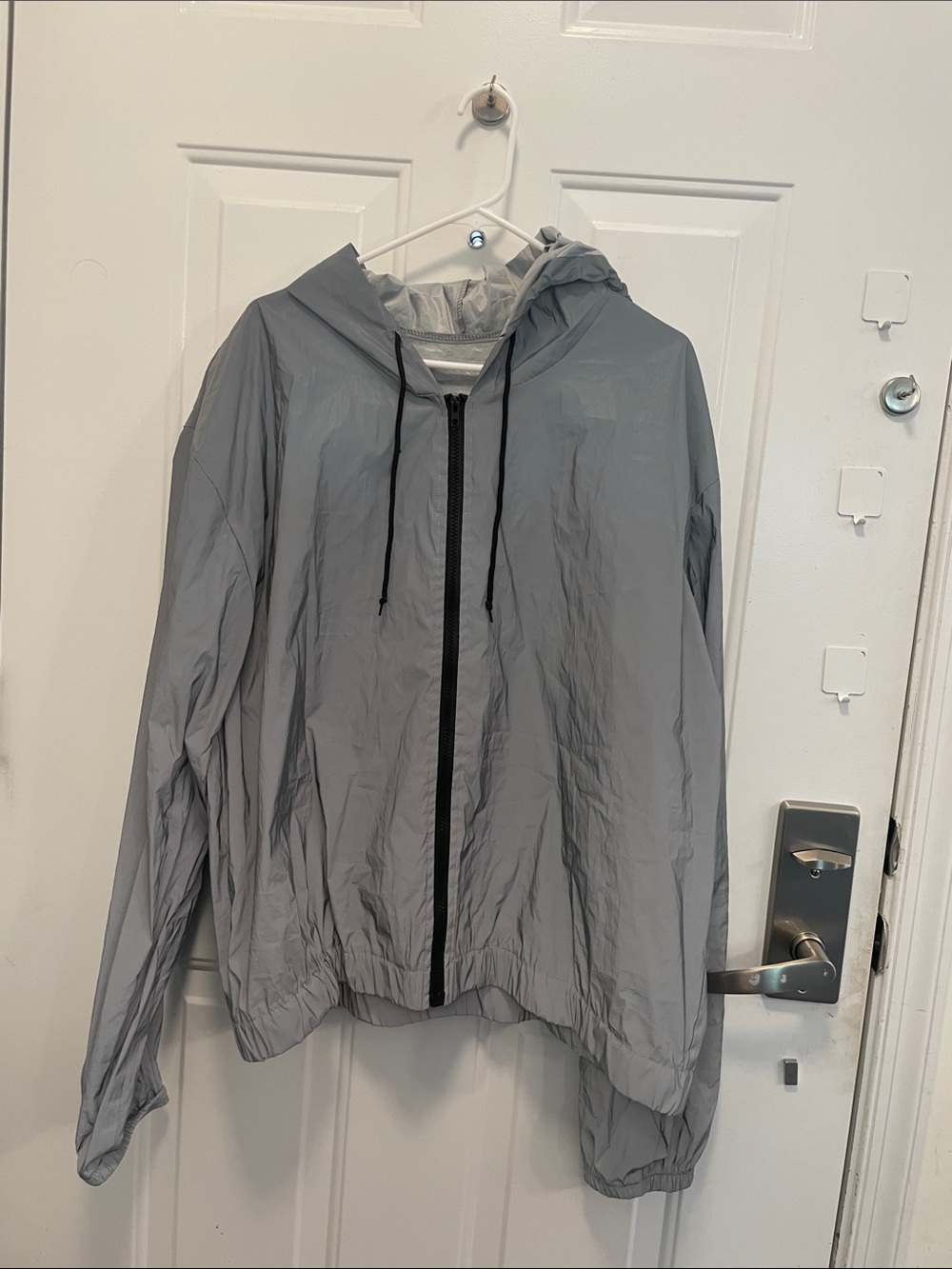 Highly reflective (see additional photo) Lightweight Hooded Windbrkr Jacket